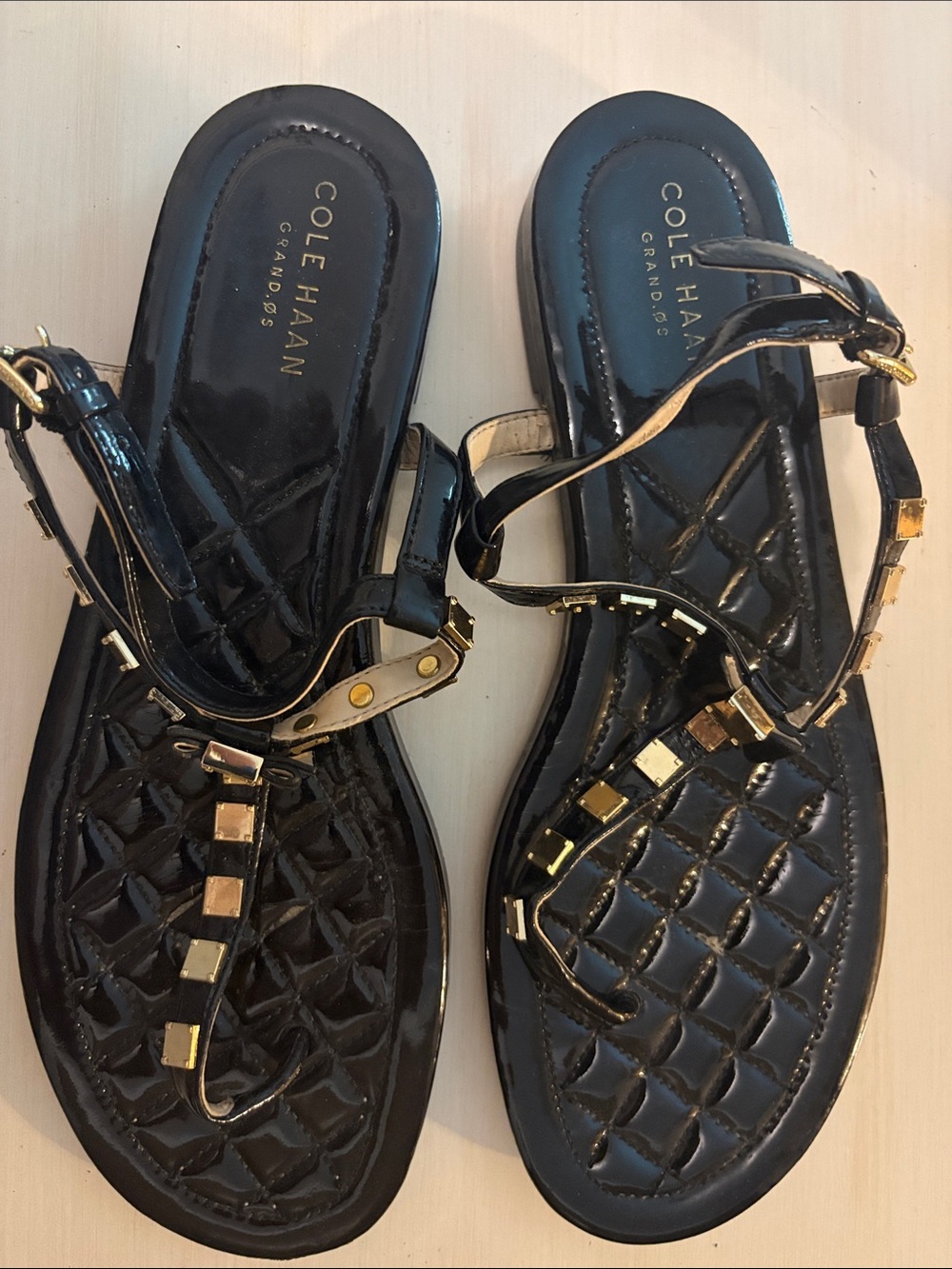 Cole Haan Black Quilted T-Strap Sandals with Gold Tone Studs